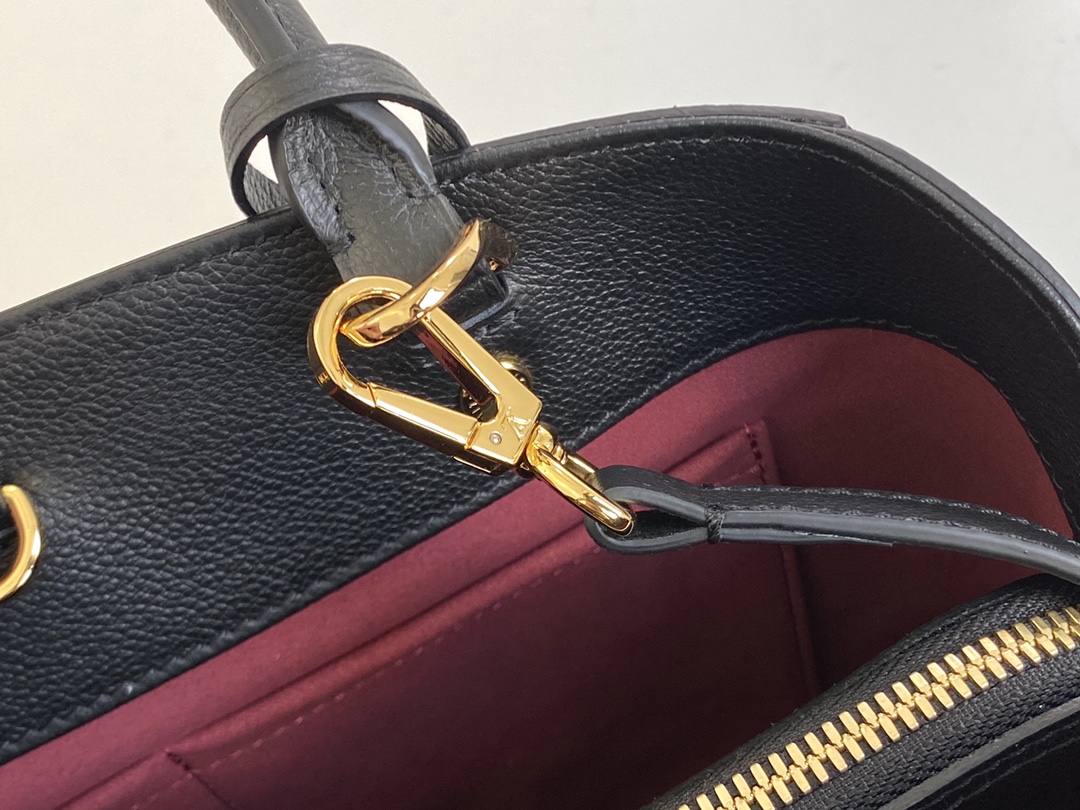 l0vis Vvtt0n montaigne mm bicolor monogram empreinte leather m45499 33 x 23 x 15 cm