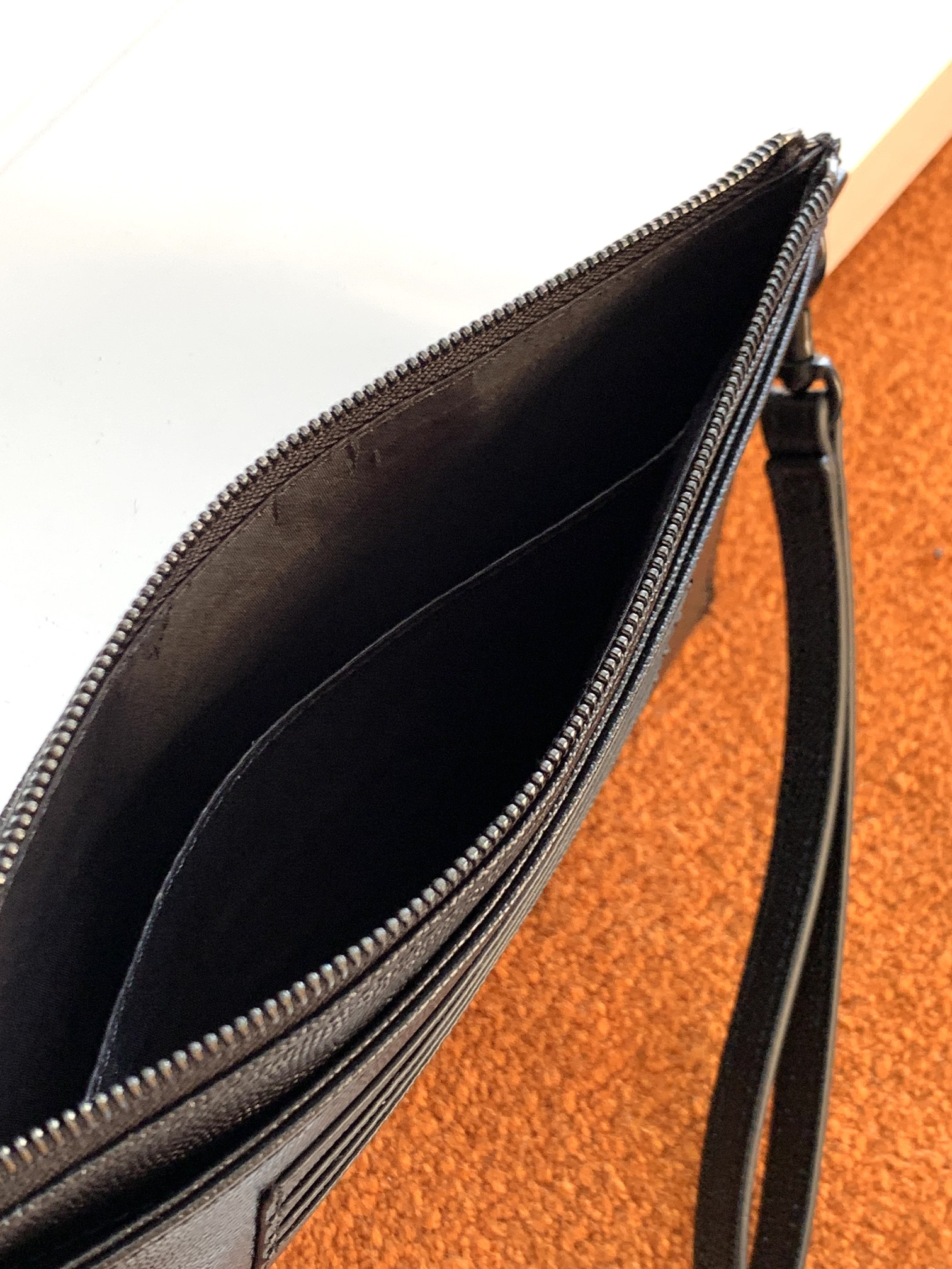 Y51 monogram large bill pouch in grain de poudre embossed leather black metal 636313 23 x 13 x 1 cm