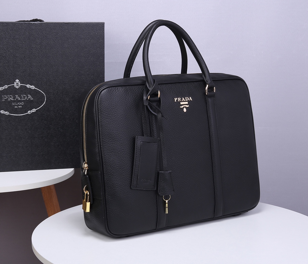 Pra*a briefcase grained cowhide leather golden metal black 8017 40 x 30 x 9 cm